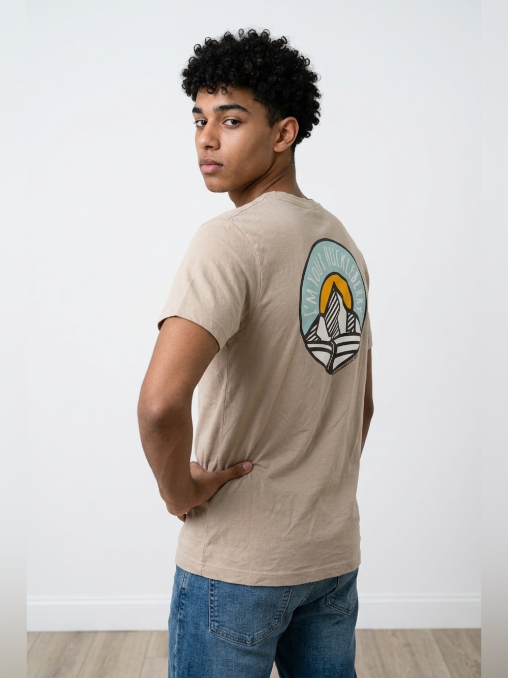 Mackay River Beige Graphic Tee – “I’m Your Huckleberry” Mountain Design